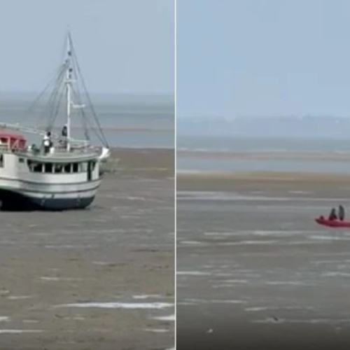 Embarcação encalha na Praia Grande devido à maré baixa e passageiros são resgatados por canoa em São Luís